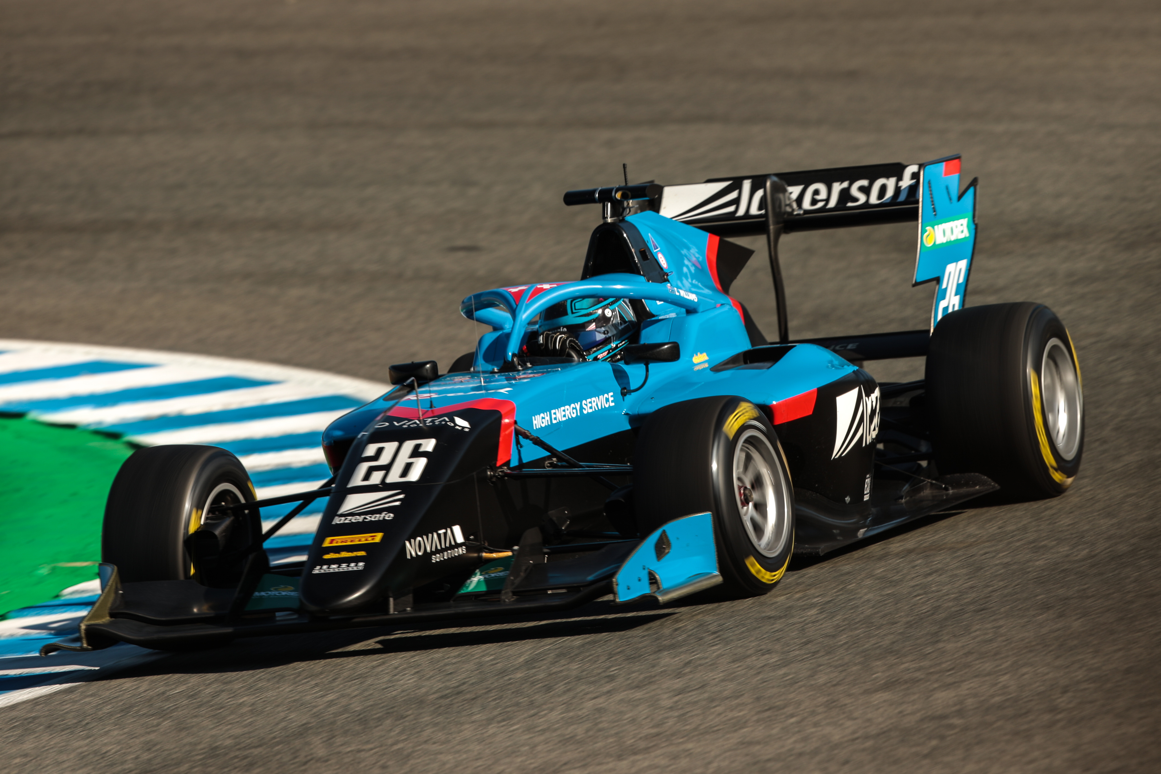 Calan Williams taking the corner on the race track