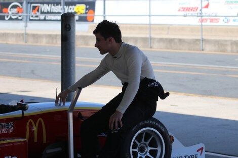 Calan Williams sitting on the car