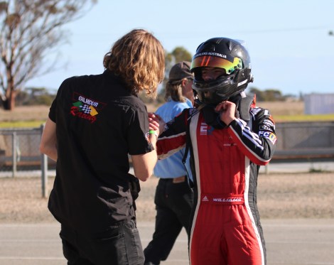 Calan Williams putting the helmet on